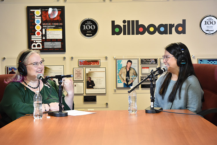 Tyra Burton sits with Jessica Reyes, Data Scientist at Equifax