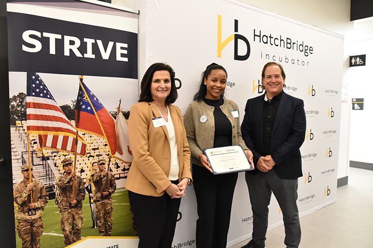 Dean Robin Cheramie stands with a student of the first cohort of STRIVE