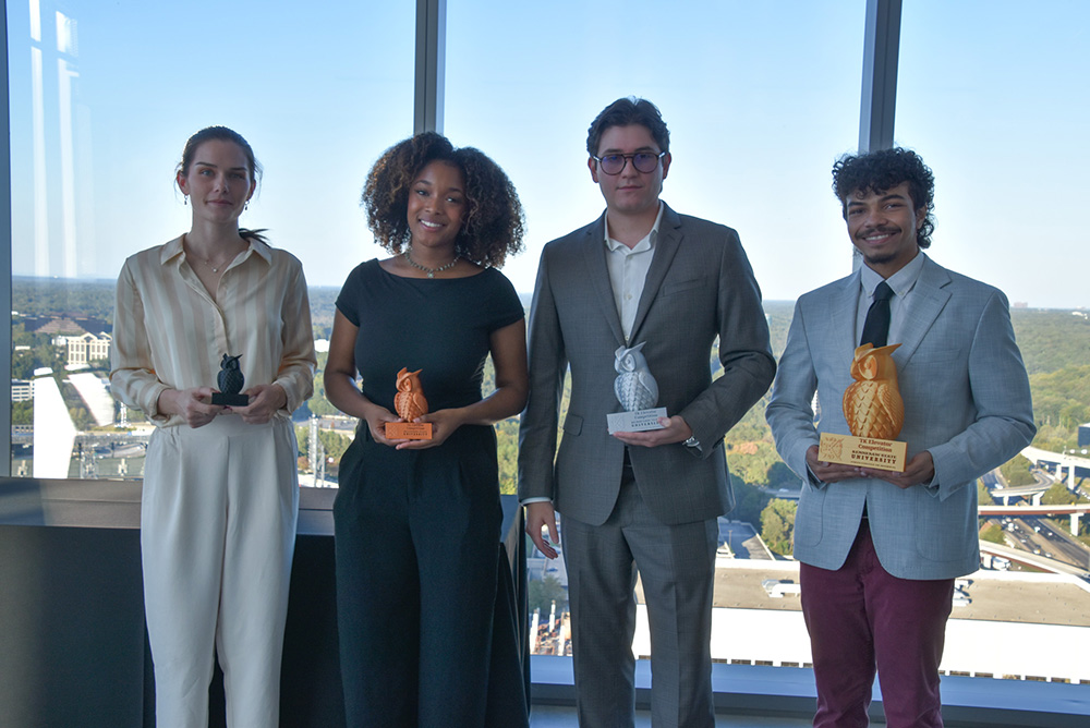 finalists of the TK Elevator Pitch Competition posing with their trophies