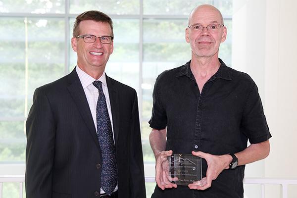  / on
Photo of Mark Anderson (left) and Distinguished Scholarship Award recipient, Michael Van Dyke, Ph.D., (right) Associate Professor of Biochemistry (CHEM) 