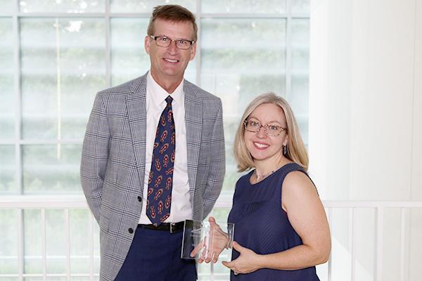  / Photo of Mark Anderson (left) and Distinguished Service Award recipient, Heather Abbott-Lyon, Ph.D., (right) Associate Professor of Chemistry (CHEM) 