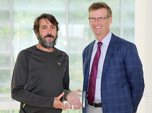  / Photo of 2016-2017 CSM Distinguished Scholarship Award recipient, Jared Taglialatela, Ph.D., Associate Professor of Biology in the Department of Ecology, Evolution, and Organismal Biology (left) and Dr. Mark Anderson (right). 