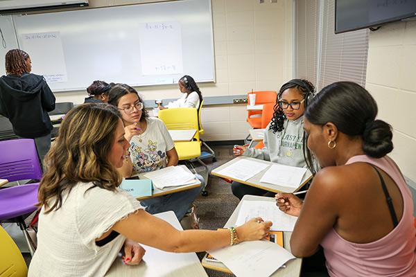 CSM PRESS program students engaged in focused work participating in a classroom activity.  / CSM PRESS program students engaged in focused work participating in a classroom activity. 