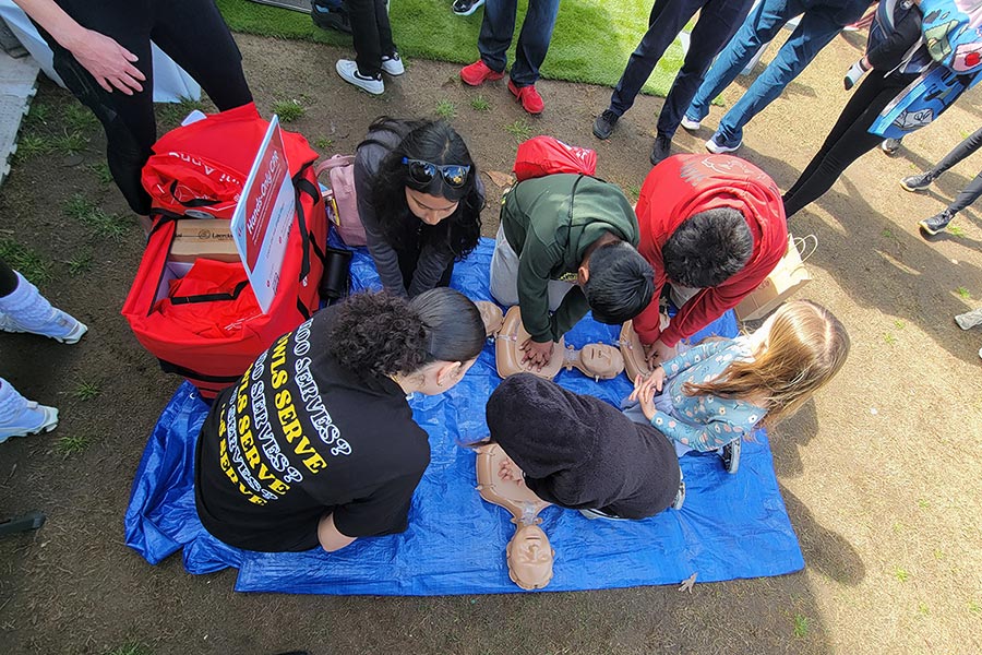 People learning cardiopulmonary resuscitation (CPR)