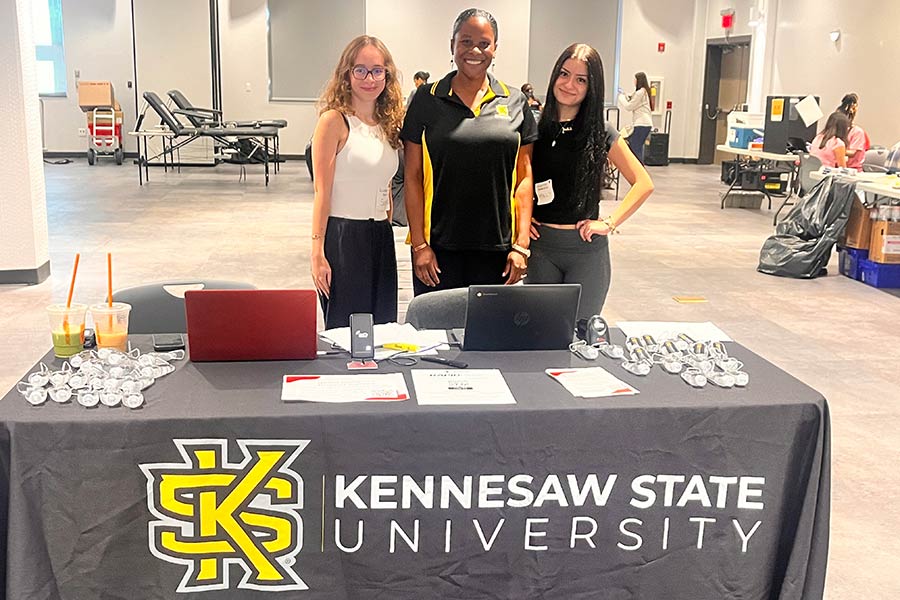 College of Science and Matheamtics faculty and students hosting a blood drive for the community at Kennesaw State University