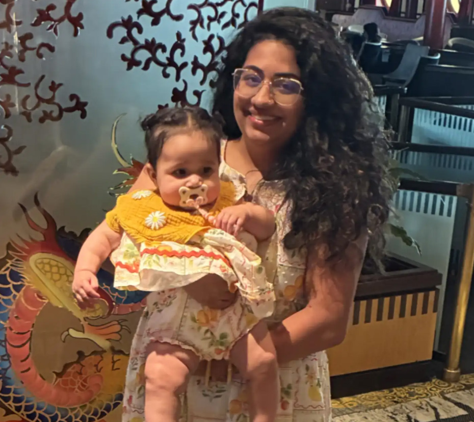 esha singh holding her baby