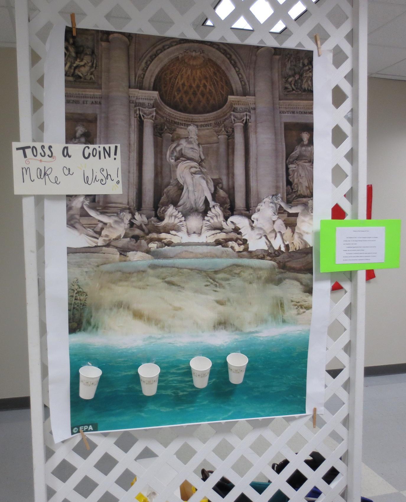  / poster of water fountain with sign saying toss a coing/make a wish