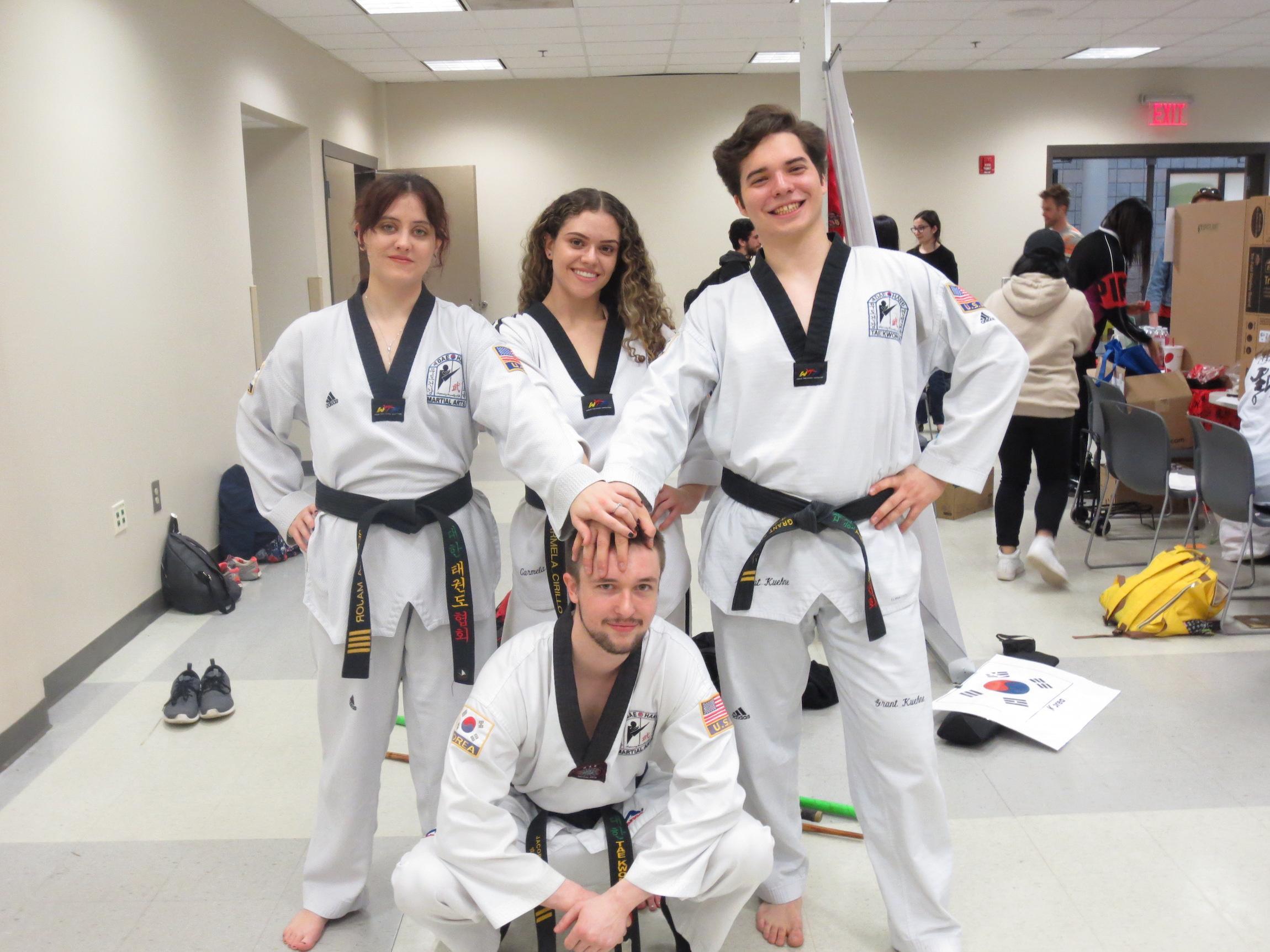  / four students in karate suits 