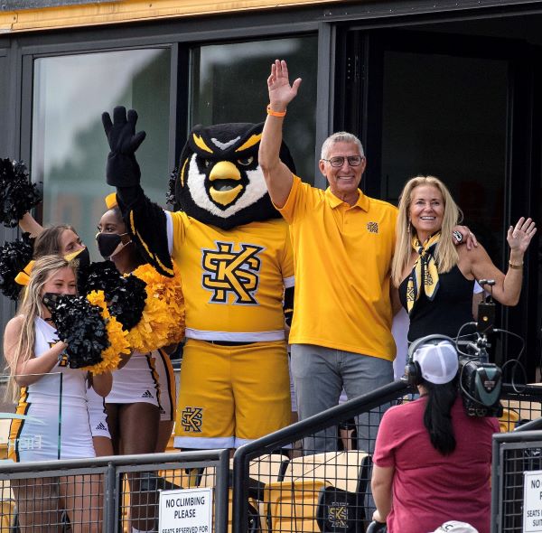 Norman J. Radow, his wife, Lindy, and Scrappy the KSU mascot, at Fifth Third Bank Stadium.