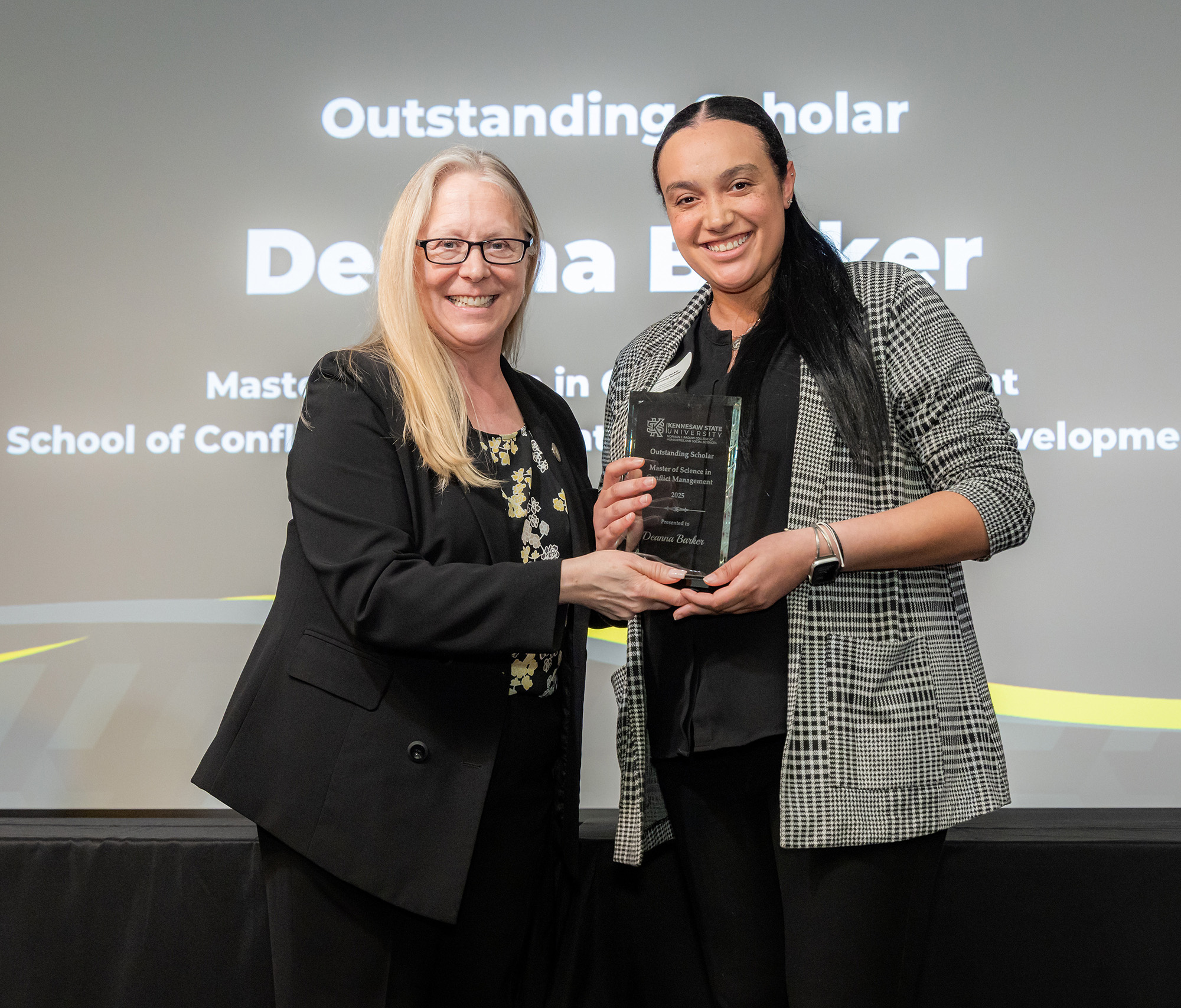 Dean Kaukinen presenting award to Dea Barker