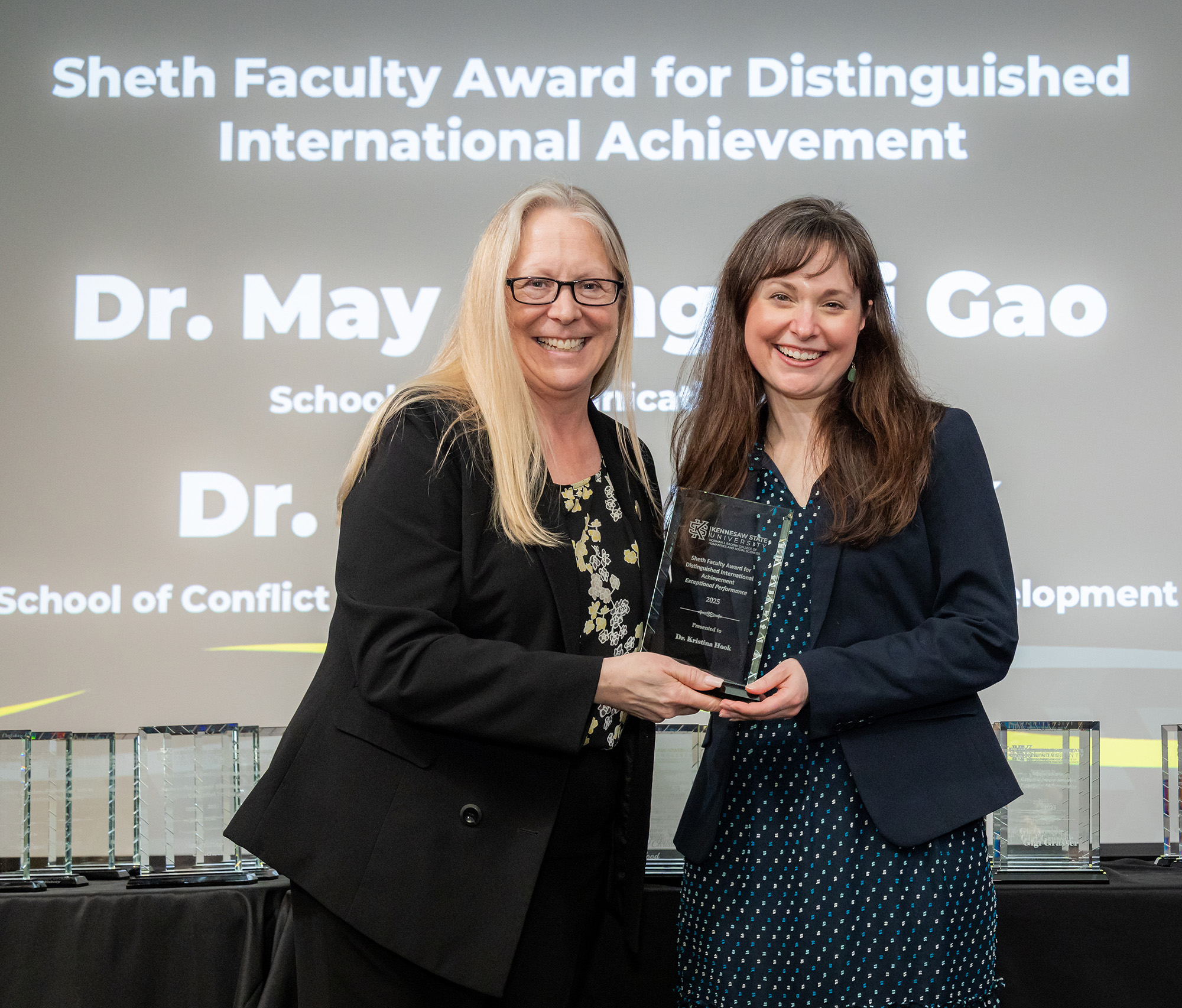 Dean Kaukinen presenting the 2025 Sheth Award to Dr. Kristina Hook