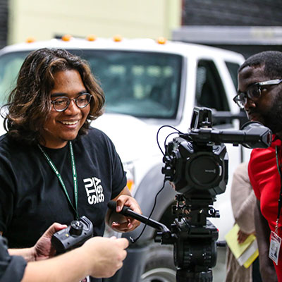students working on camera