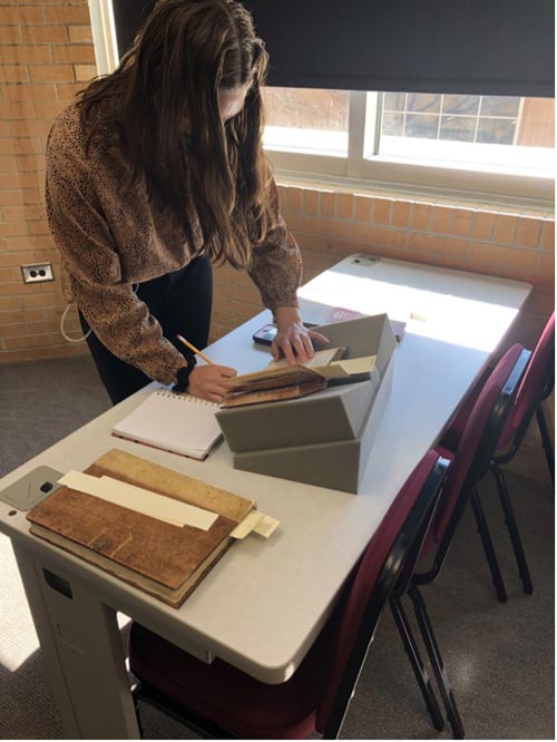 Morgan Bendzinski, interning at KSU's Archives and Bentley Rare Book Museum