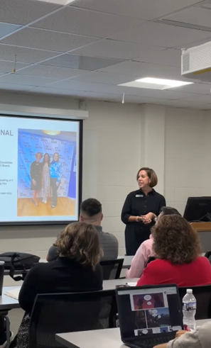 Nicole Lawson Doll speaks to students in the Public Administration Student Association insaide of a classroom