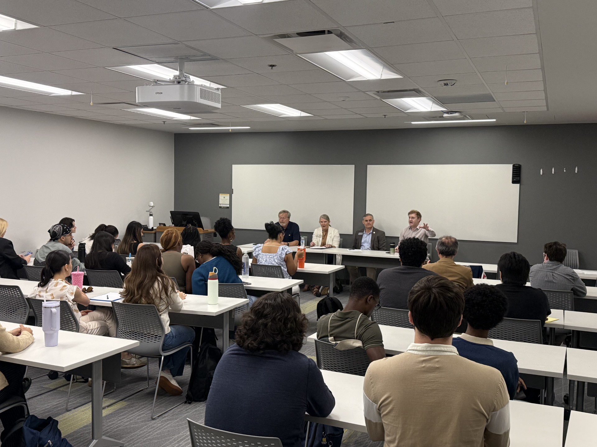 Students listen to Georgia lawmakers discuss political extremism, violence, and civility during the SGIA Civil Political Dialogue at Kennesaw State University.