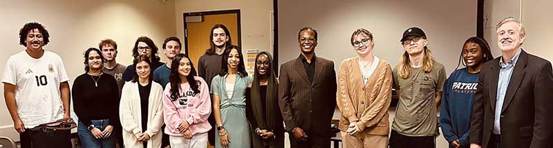 US Diplomat Andrei Cotton is with Dr. Stephen Collins and his students in POLS 2230 Careers in International Affairs