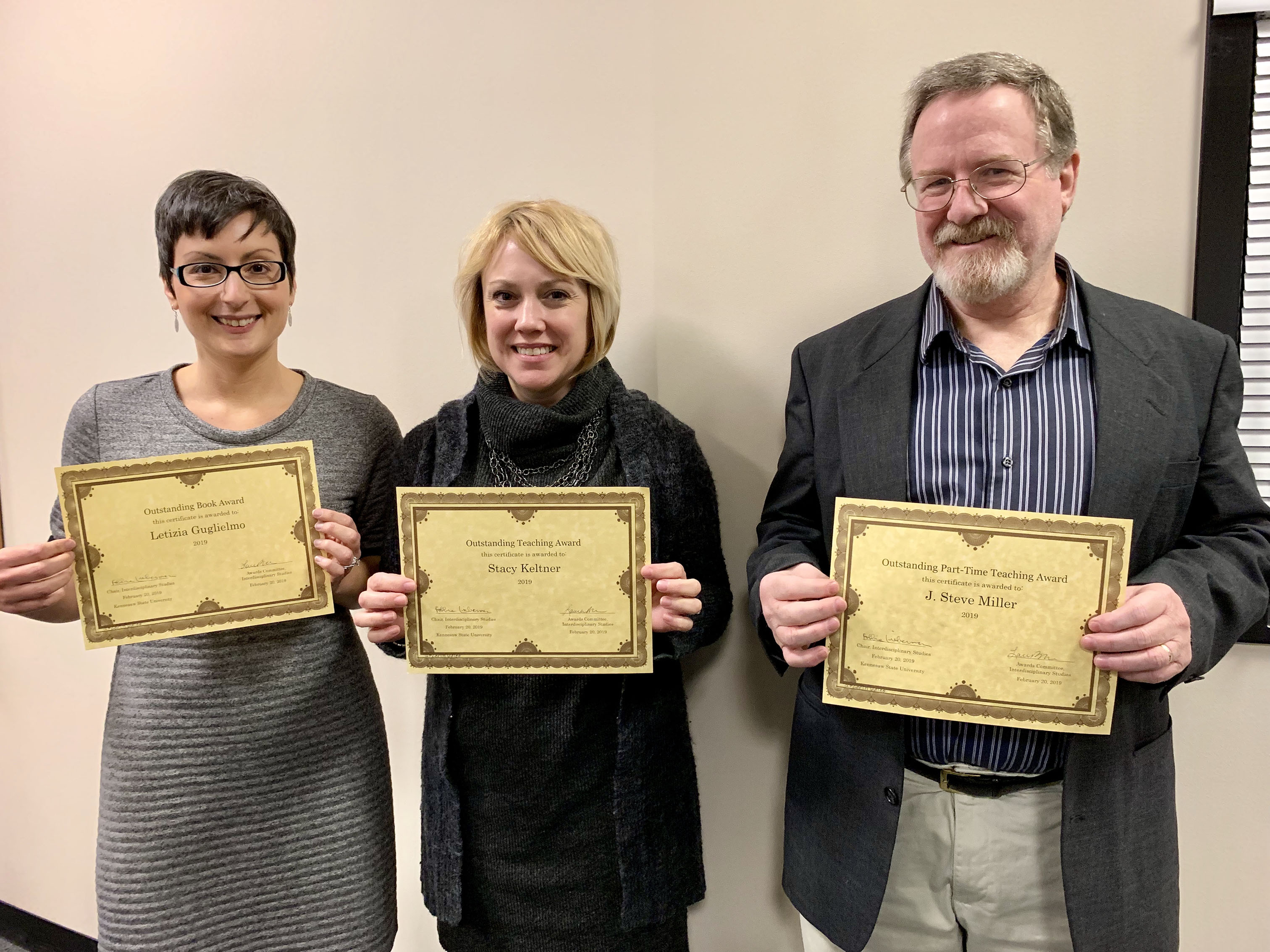 faculty with their awards
