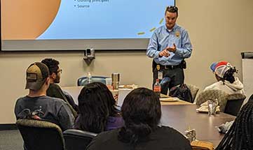 Cobb County Chief Stuart VanHoozer speaks to Kennesaw State Students