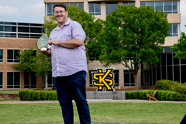 Dr. Daniel Farr on his receipt of the Distinguished Honors Capstone Mentor Award, Journey Honors College