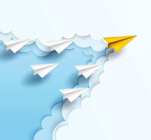 A paper airplane in flight against a backdrop of clouds, illustrating the essence of leadership and visionary thinking.