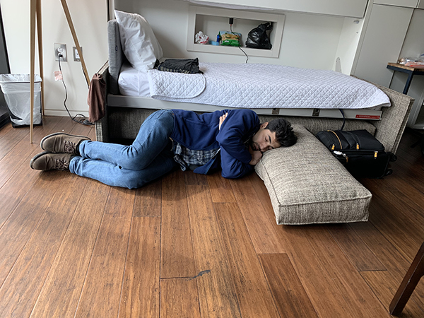 PhD student "sleeping" as part of protest during humanitarian simulation