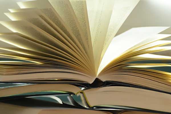 open books stacked on each other