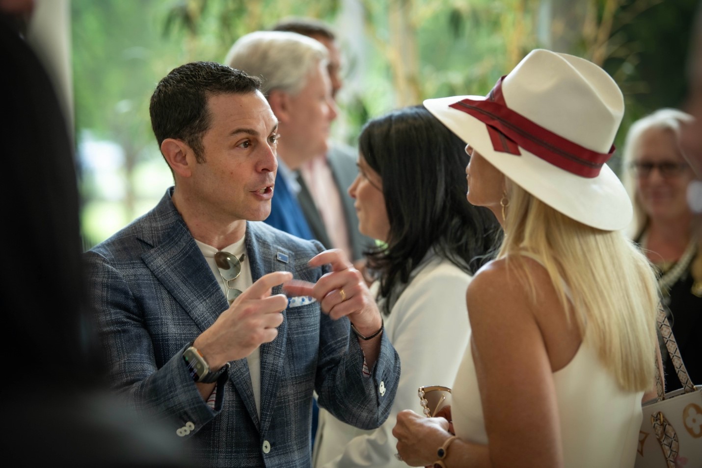 Dean of Radow College speaking with Rockefeller Capital Management