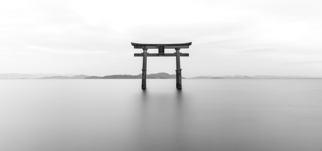 A tori gate stands majestically in the ocean
