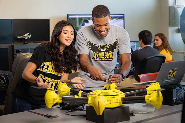 students working on aerospace drone at ksu