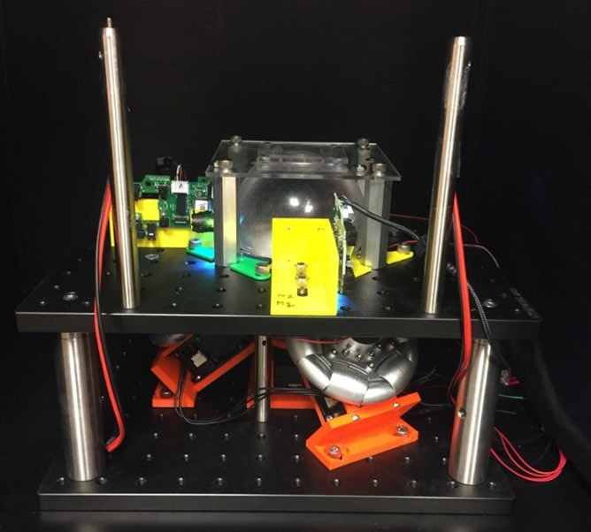 Transparent Omnidirectional Locomotion Compensator (TOLC) for small insects