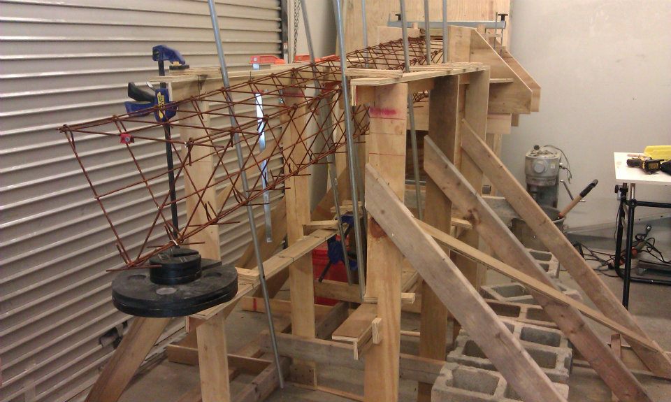 Cantilever load testing of a triangular wall section.