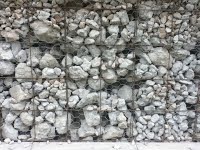 Rubble filled into wire baskets