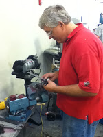 Concrete added to cover rubble and mesh on building structure