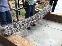 Triangular rubble column subjected to sag test