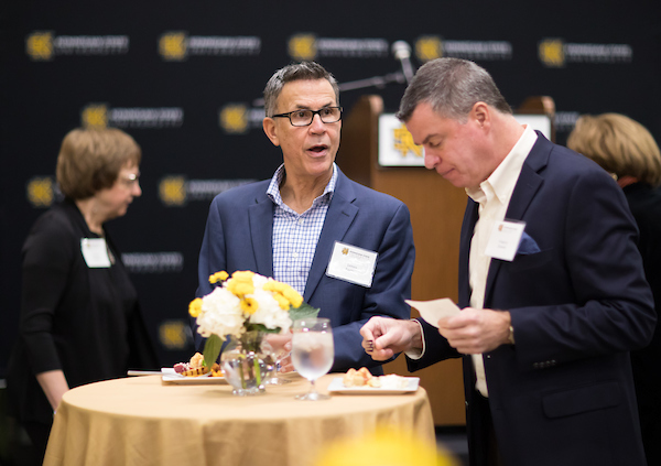 professors at a ksu hospitality event