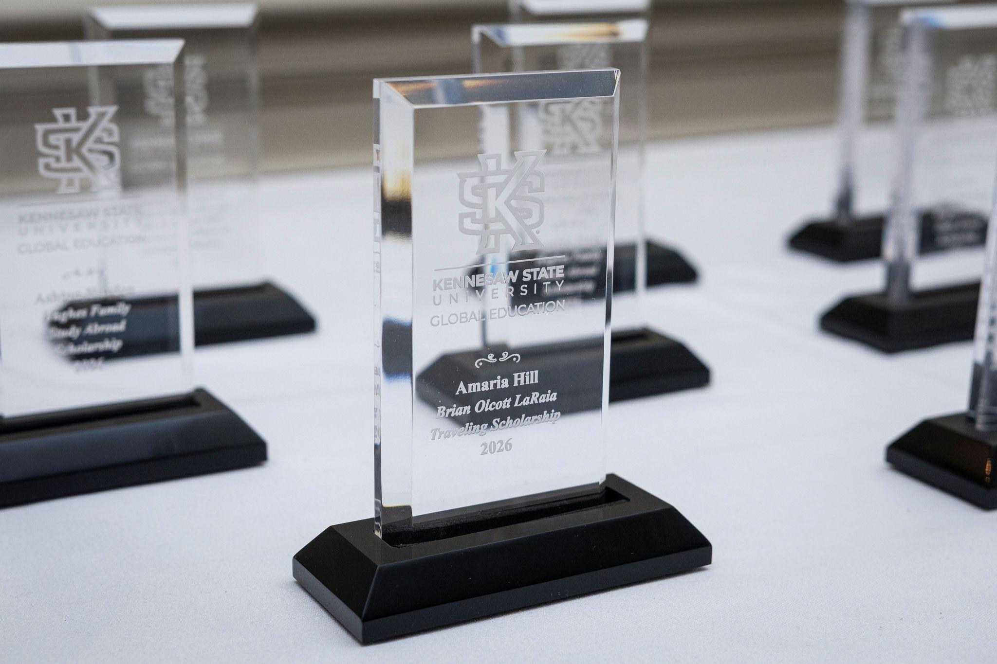International Achievement Awards and Scholarship Ceremony 2026 / Scholarship award sitting on a table.