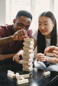 two people playing Jenga