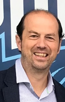 Ion Vlad smiling at the camera