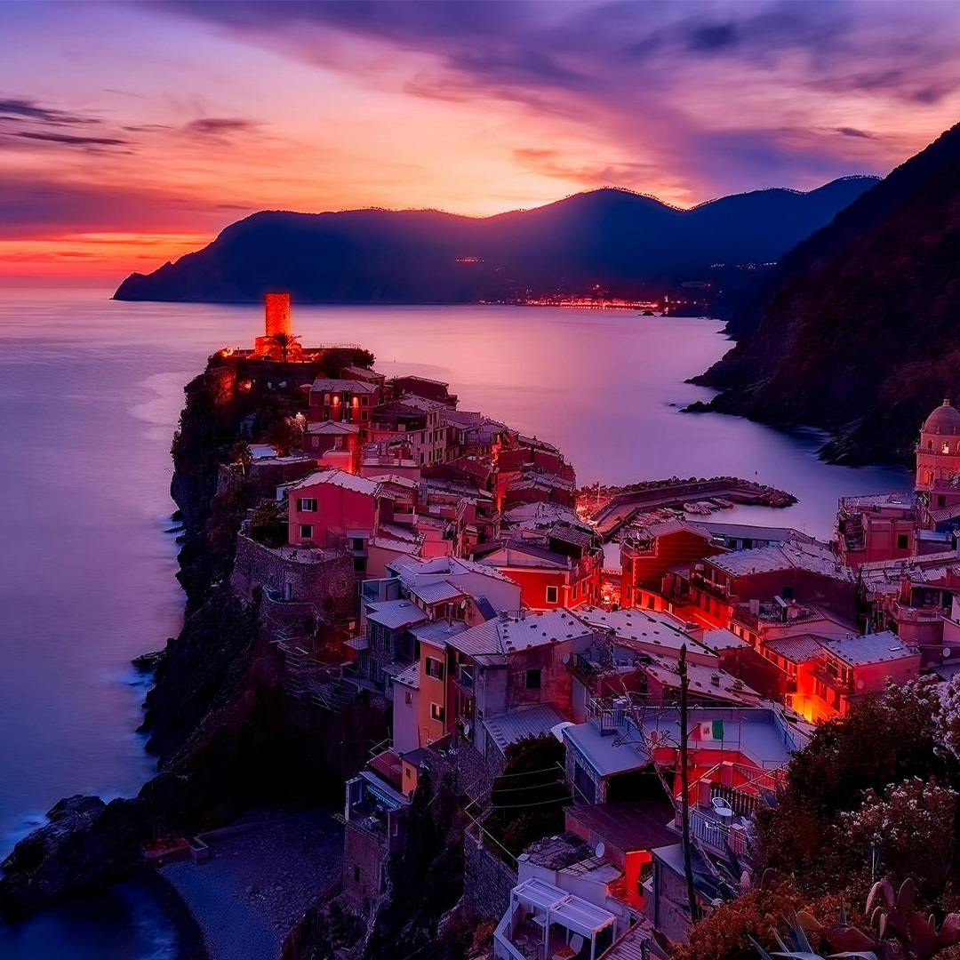 italy at night near water and mountains
