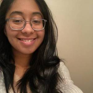 picture of sarah: has long dark hair and glasses