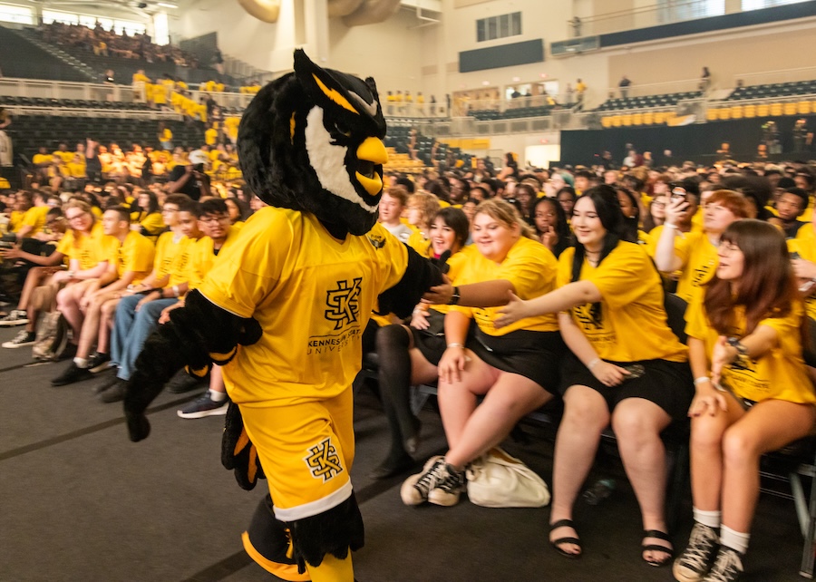 scrappy high-fiving students