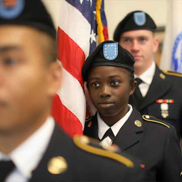 military student with flag