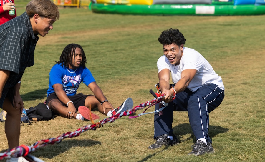 sophomore social student playing tug-o-war