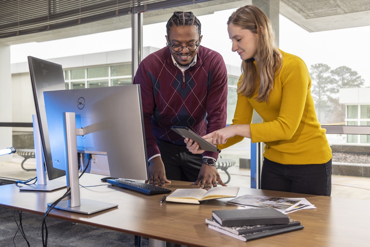 students looking at tablet