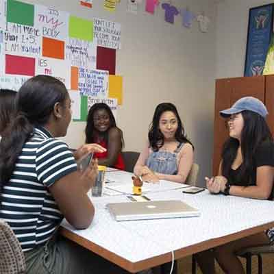 students sitting around a table