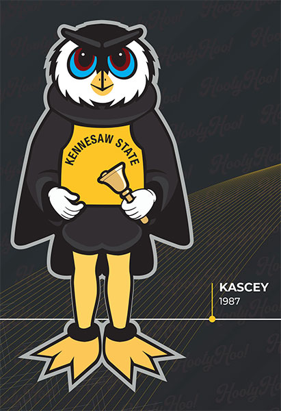 Illustrated owl mascot wearing a "Kennesaw State" vest, holding a bell. The owl, named Kasey, looks determined. Text reads "Kasey 1987" on a patterned background.