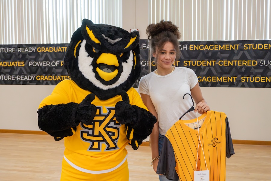 Adri'anna Caraway with Scrappy