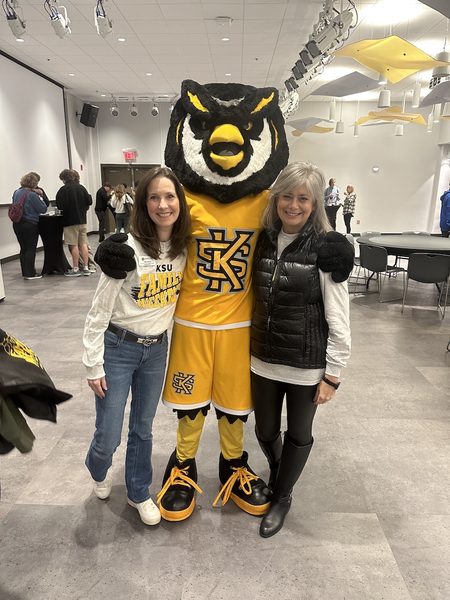 Scrappy posing with parents