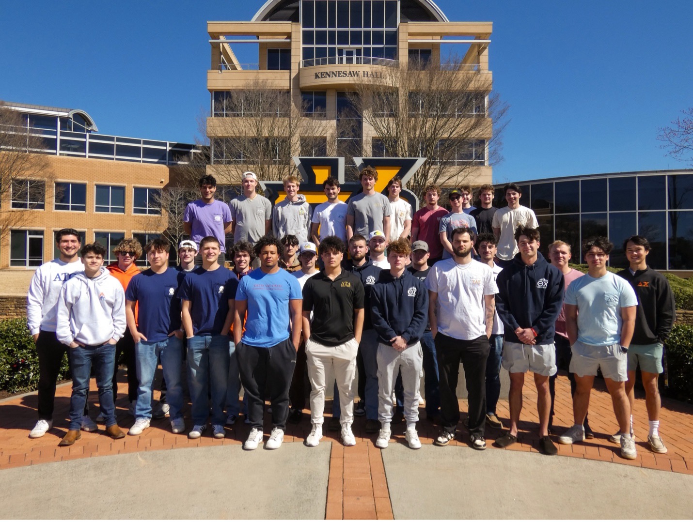 2025 IFC students in front of the KS Sign