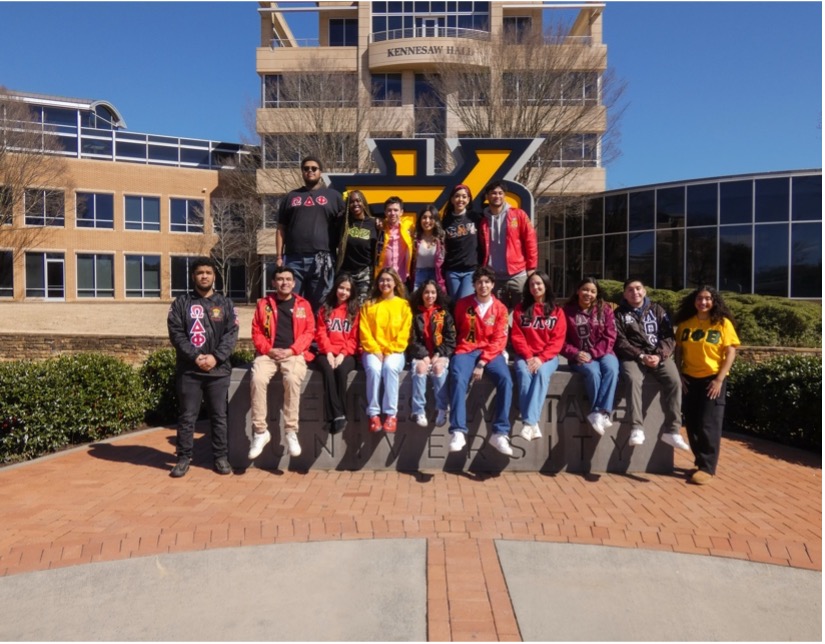 mgc students in front of KS sign